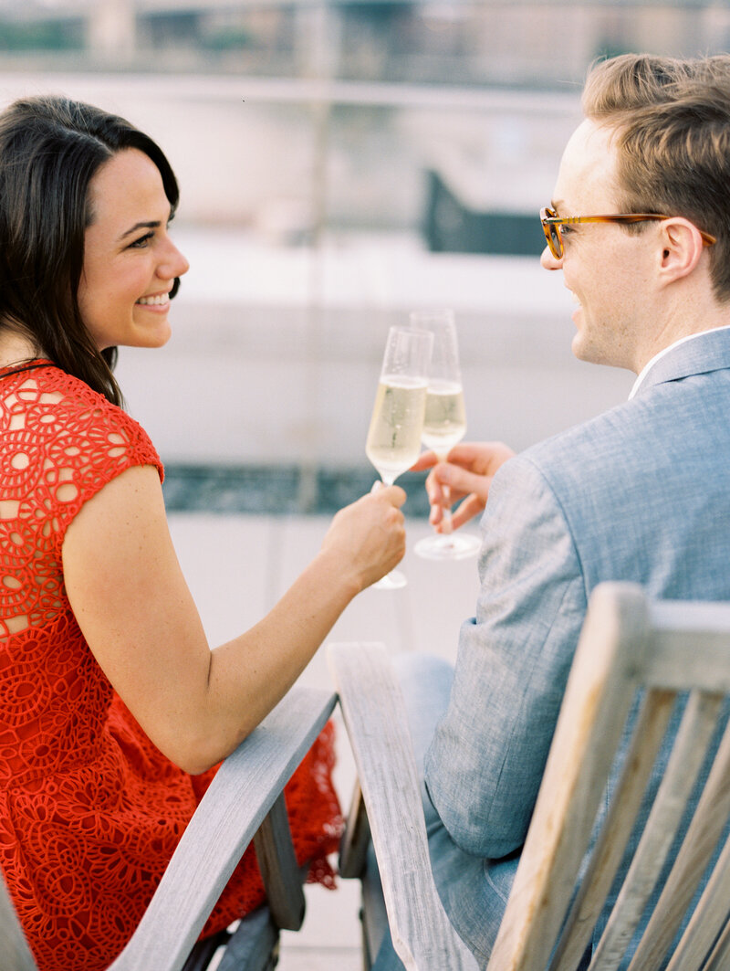 Rooftop new york city engagement session with champagne