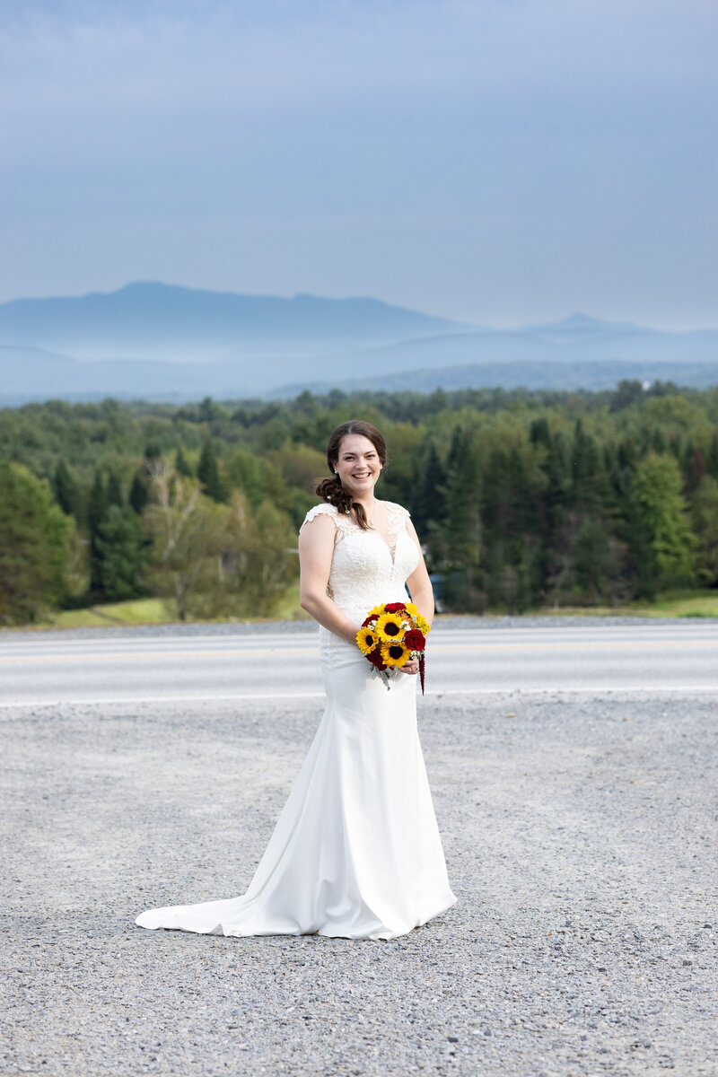 VERMONT-WEDDING-PHOTOGRAPHER-TAKING-PHOTO-OF-BRIDE