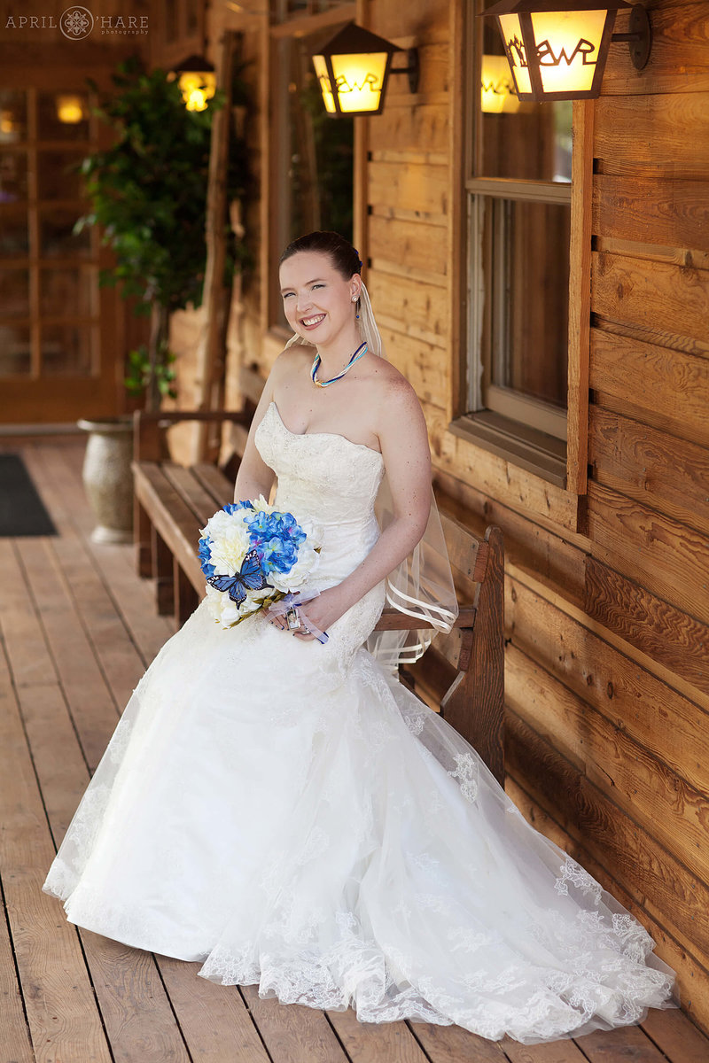 Bridal portrait on the front patio of Wild Basin Lodge in Allenspark Colorado