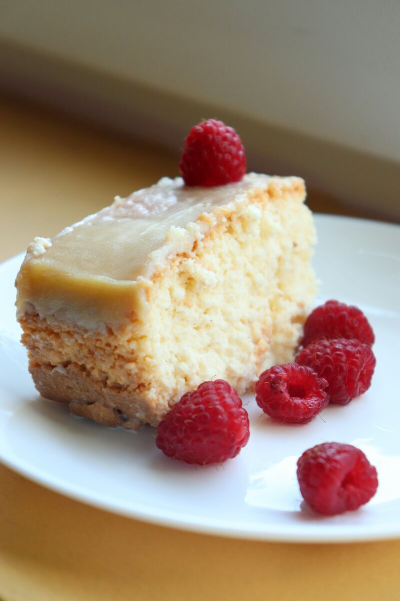 Hart and Main quincenera tres leches cake with raspberry granishes 