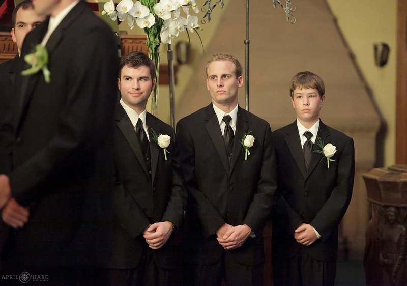 Groomsmen look on during ceremony at Central Presbyterian Church