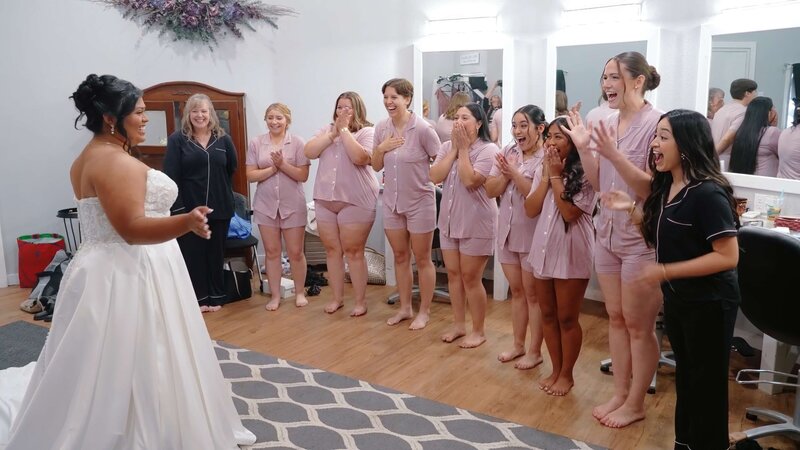 bride and groom's hands display thie wedding bands