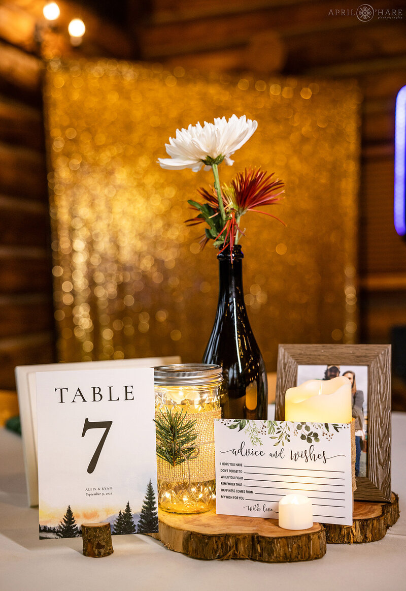 Table Centerpiece with Advice for the Couple Cards at Evergreen Lake House Wedding Reception