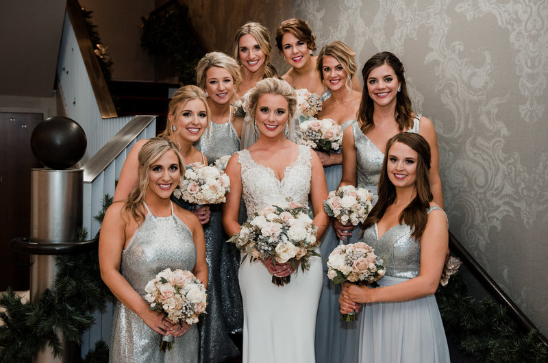 bridesmaids wedding photos with neutral bridesmaids flowers