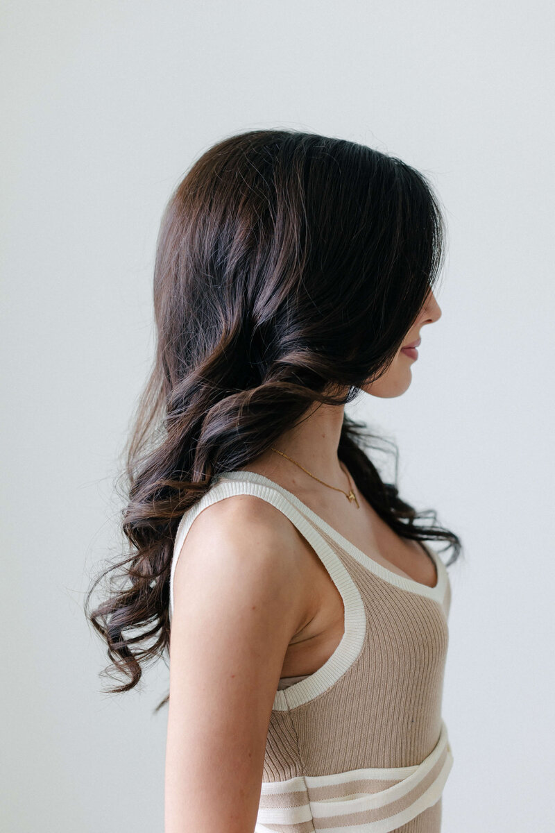 Bold and voluminous Fort Worth blowout with glamorous curls and serious bounce.