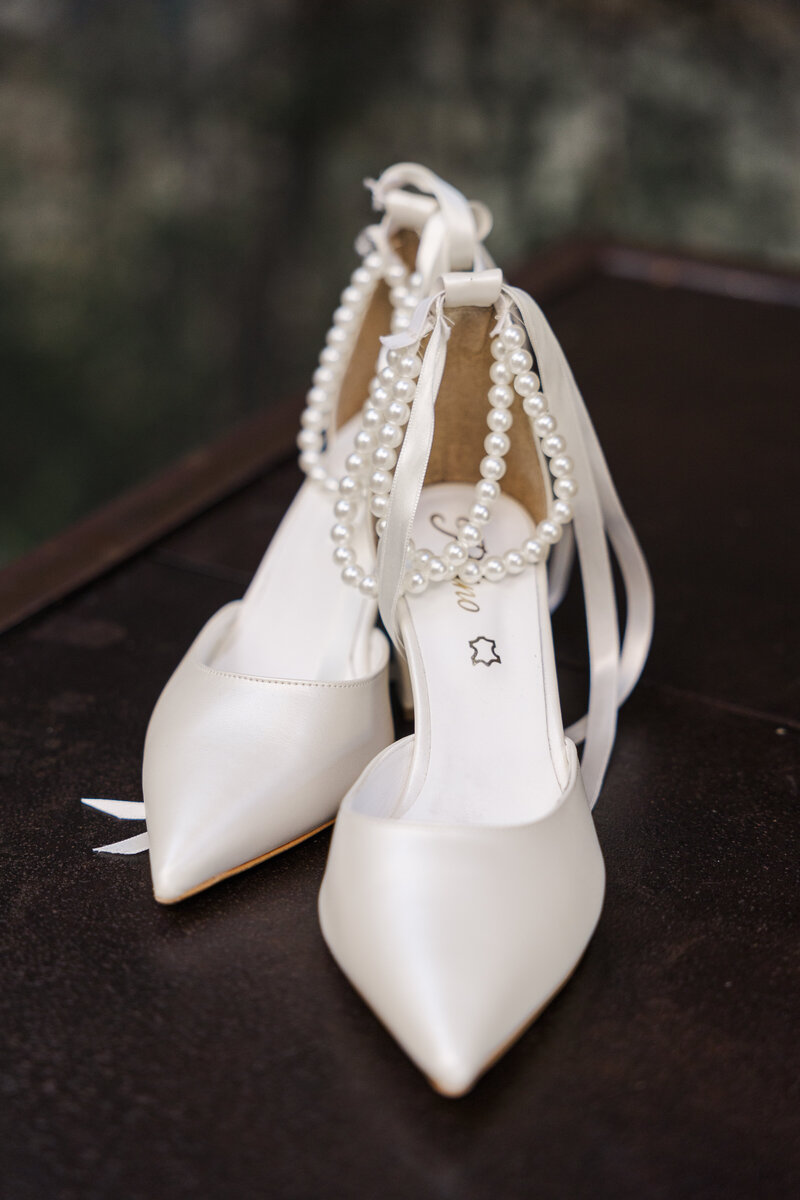Cute bridal details of Intimate Micro Wedding styled shoot of wedding bouquet, bridal shoes, and boutonniere
