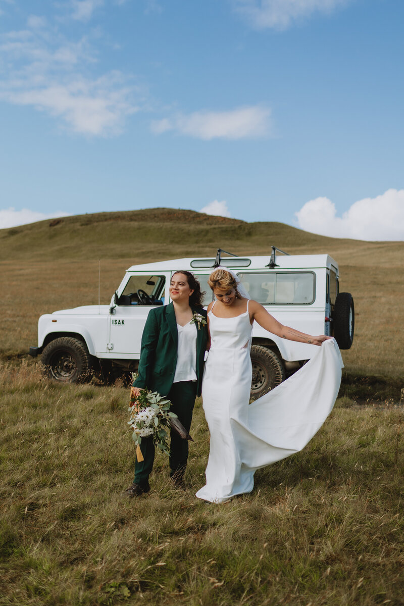 brides in front of jeep