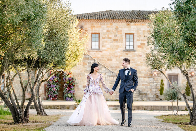 bride and groom walking at sunstone villa