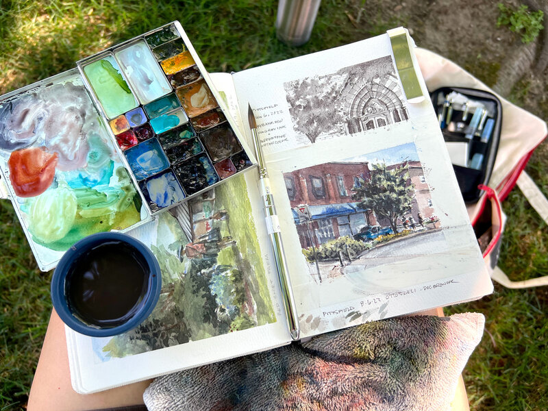 Jill Gustavis Headshot with a sketchbook