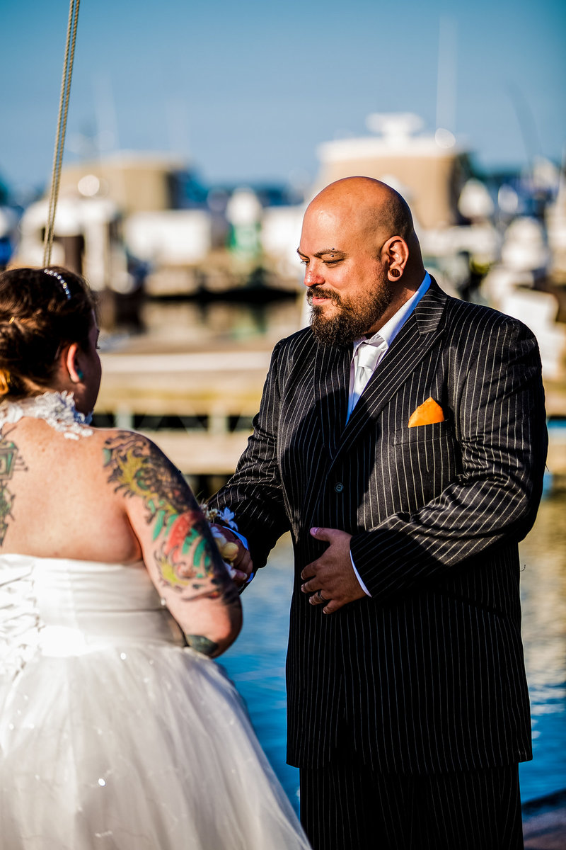 Groom looking lovingly at bride during an Erie Yacht Club wedding