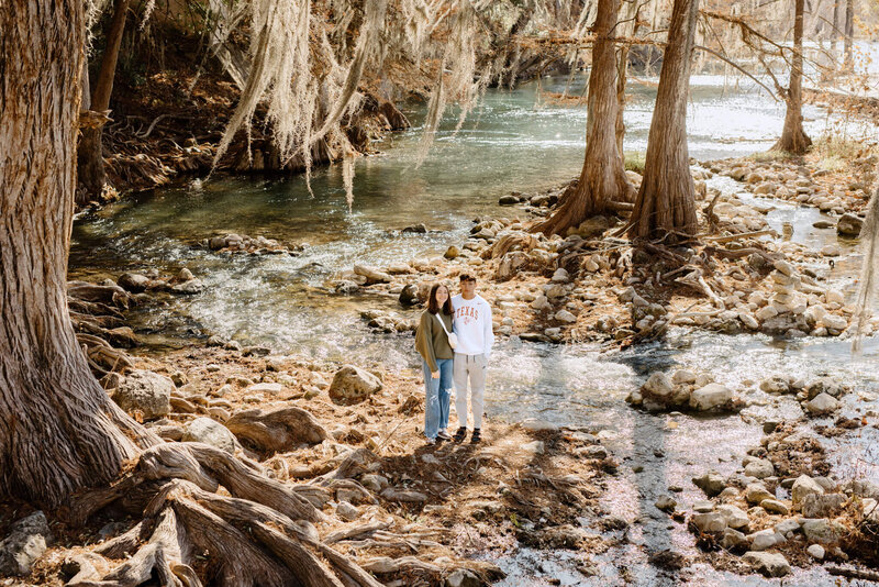 Family Portrait standing in the river in Gruene, TX