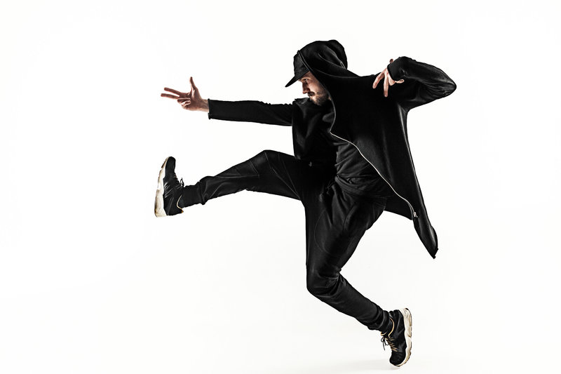 the-silhouette-of-one-hip-hop-male-break-dancer-PTSY2QP
