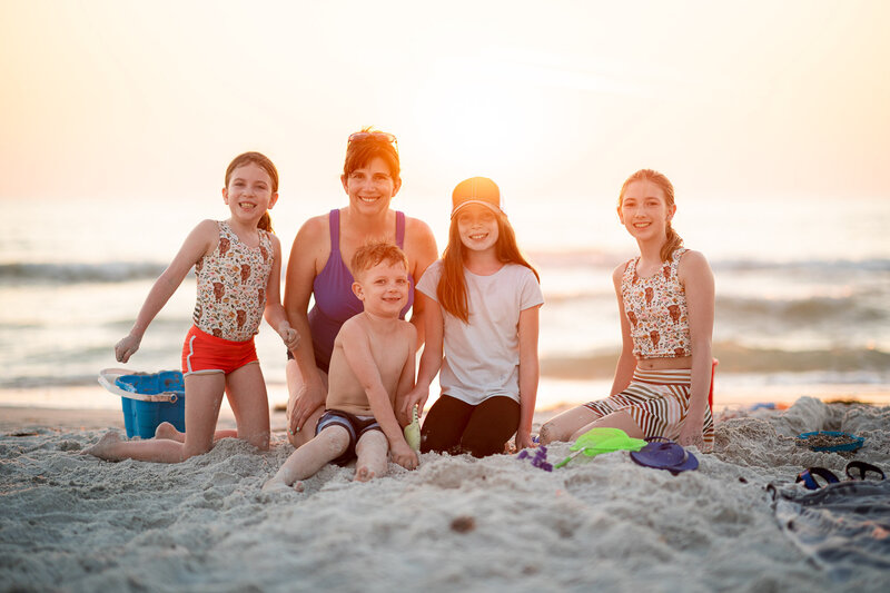Amber and kids on beach in Florida