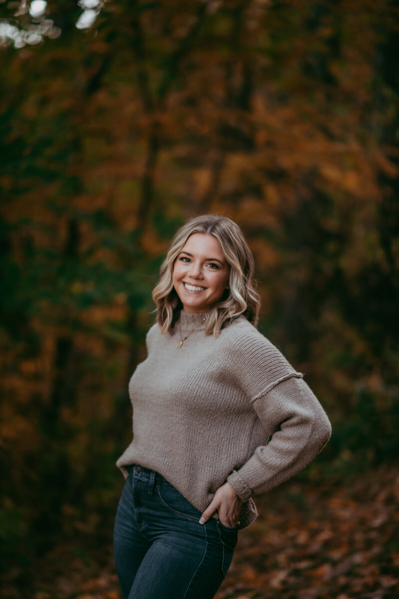Katie Schwartz, a weight-inclusive Registered Dietitian in Asheville, NC, smiling during a virtual nutrition counseling session that reflects her calm, welcoming approach.