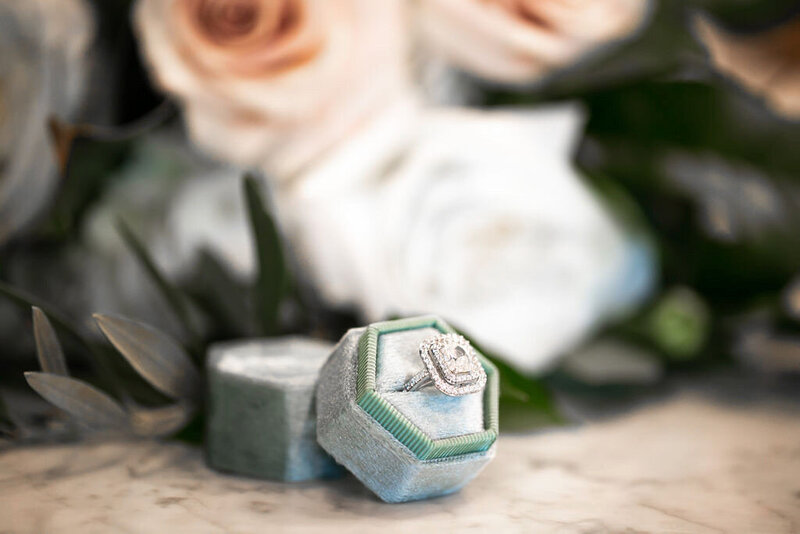 wedding-rings-blue-box-blush-flowers