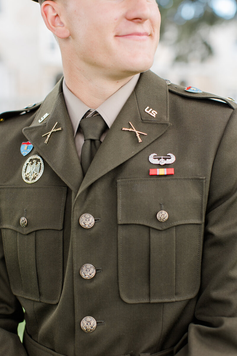 close-up of groom's jacket for military wedding