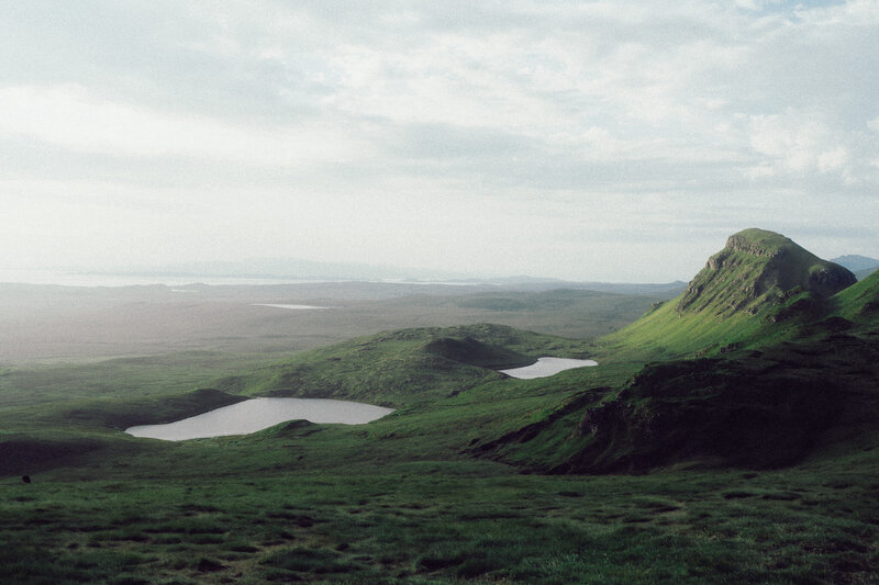A breathtaking view of Loch Achtriochtan in Glen Coe, capturing the tranquil lake surrounded by majestic mountains and natural beauty