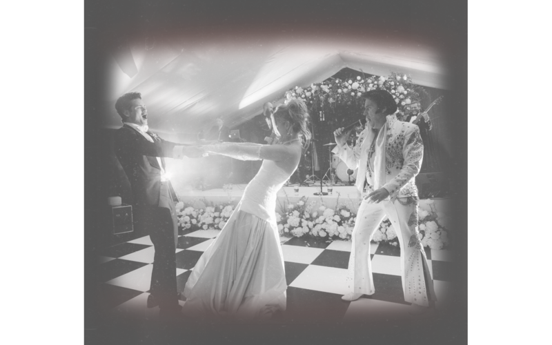 newlyweds and elvis on dance floor