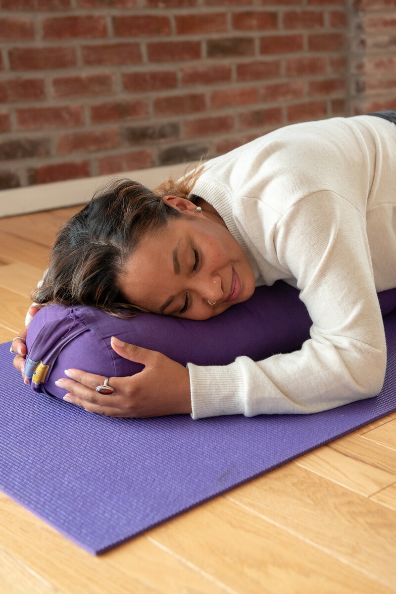 girl in relaxing yin yoga pose