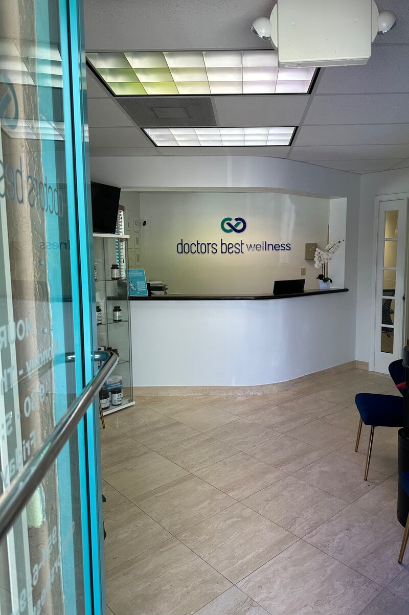 Lobby of functional medicine office with logo