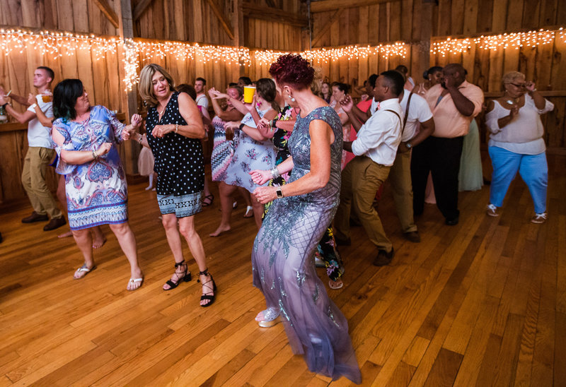 Guests dance at Betsy's Barn wedding reception