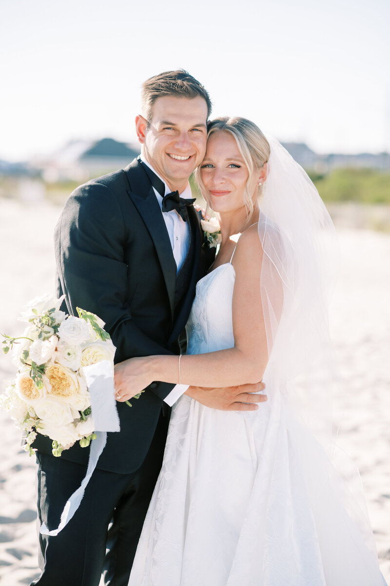 Romantic newlywed portraits captured at Cape May Beach steps away from Congress Hall captured by NJ Wedding Photographers | Michelle Behre Photography