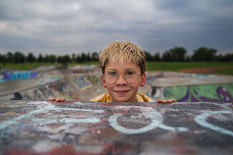 photo of a boy at a skatepark