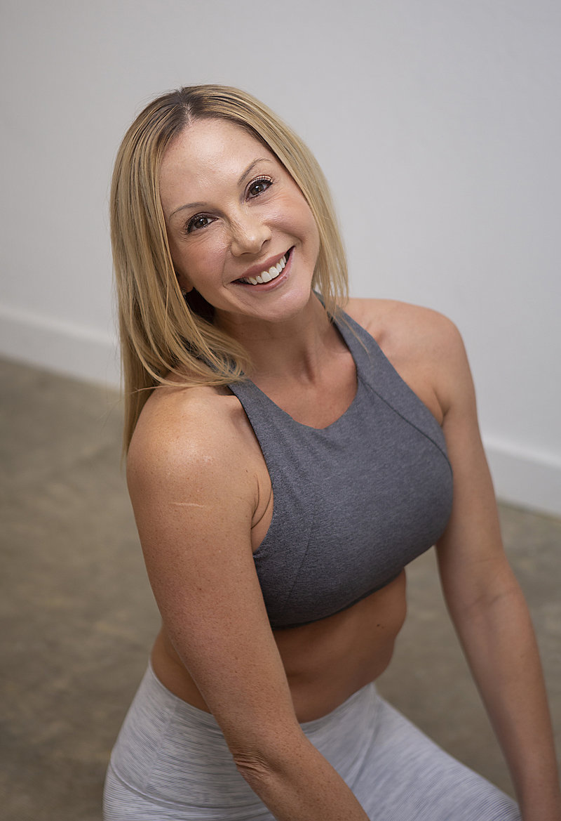 Smiling photo of Nicole Duke, owner of Hotsource Yoga studio in Aptos, CA