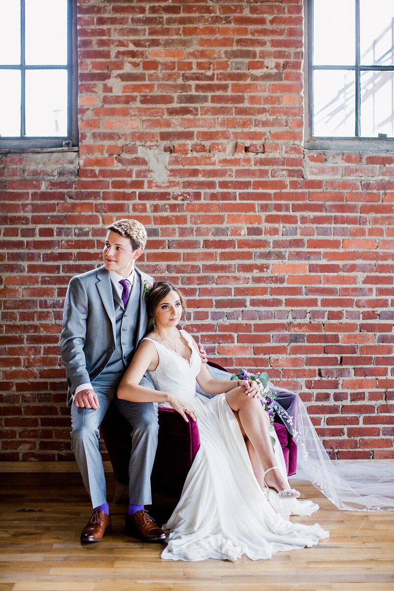 couple sitting down by Knoxville Wedding Photographer, Amanda May Photos