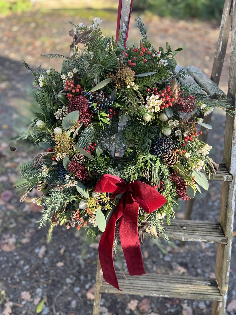 Christmas wreath workshop at Dulwich College with Pesh flowers. Wreath workshop Kent and London