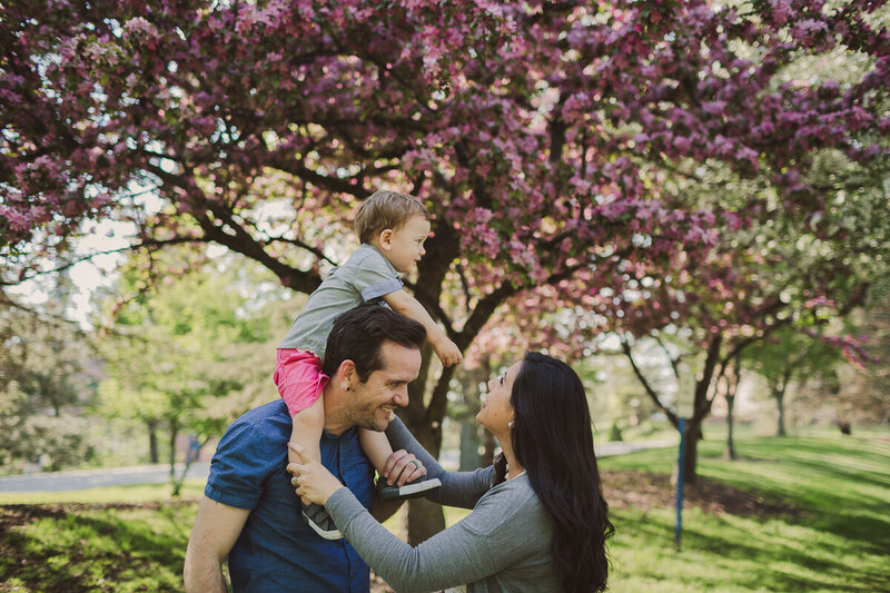 family in apple blossoms