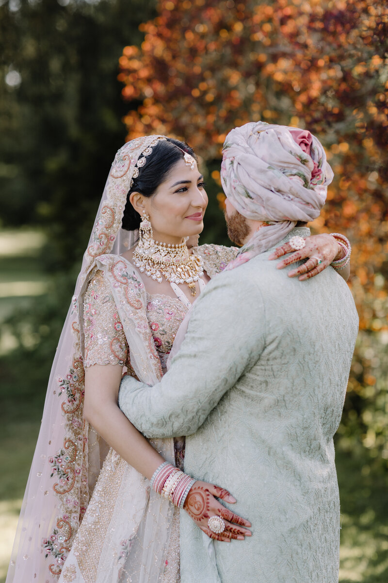 Manisha and Aydin at their Indian fusion wedding in England.