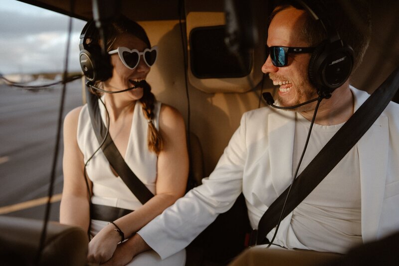 Couple taking off in a helicopter during their Hawaii elopement