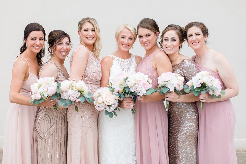 Bridal party in Elegant pink dresses for a  Military Wedding at the Fair Barn in Pinehurst NC