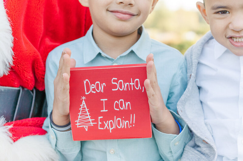 santa sign during Christmas mini session in Prince William County, VA