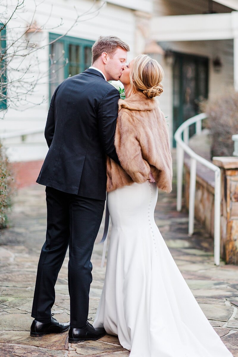 bride wearing faux fur cape by Knoxville Wedding Photographer, Amanda May Photos