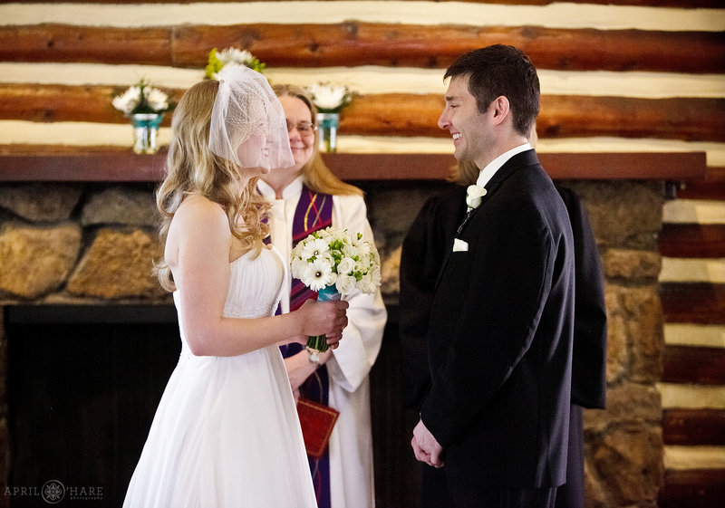 Indoor wedding ceremony on a cold spring day at The Inn at Hudson Gardens