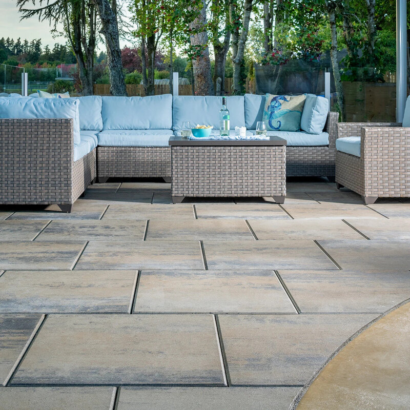 Belgard paver patio with outdoor furniture in the background. 
