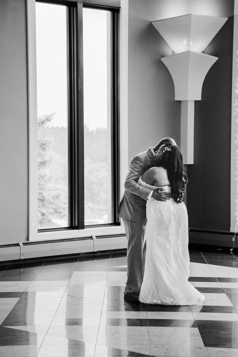 Bride and groom sharing romantic first dance in ballroom – photographed by wedding photographer Niko Coric – Lumen Clarity Media
