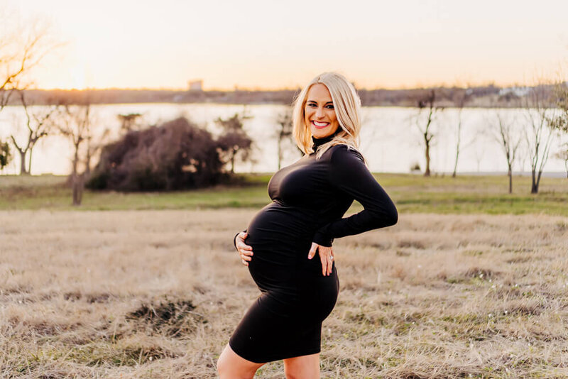 Maternity photography session at Dallas white rock lake mom in  fitted black maternity dress