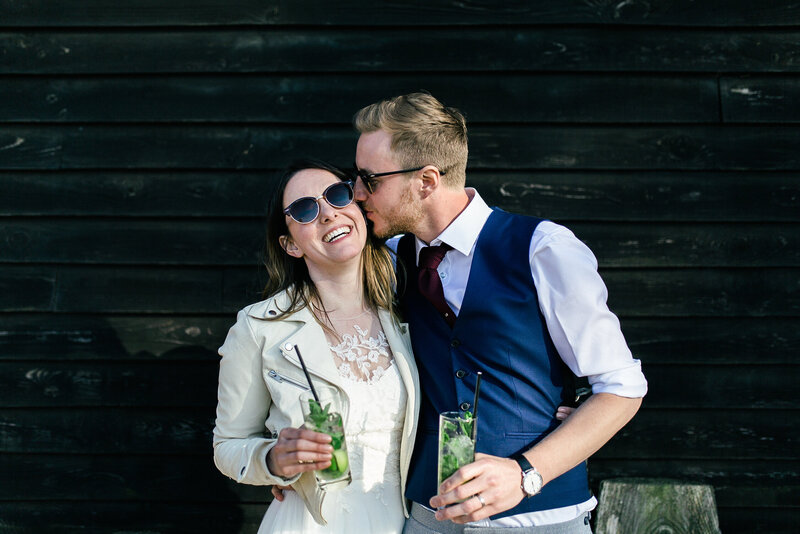 bride and groom rock and roll sunglasses fun drink photo
