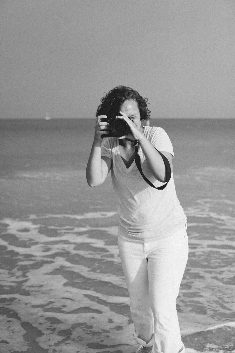 Lexington KY photographer, Priscilla Baierlein, with camera on Honeymoon Island, FL.