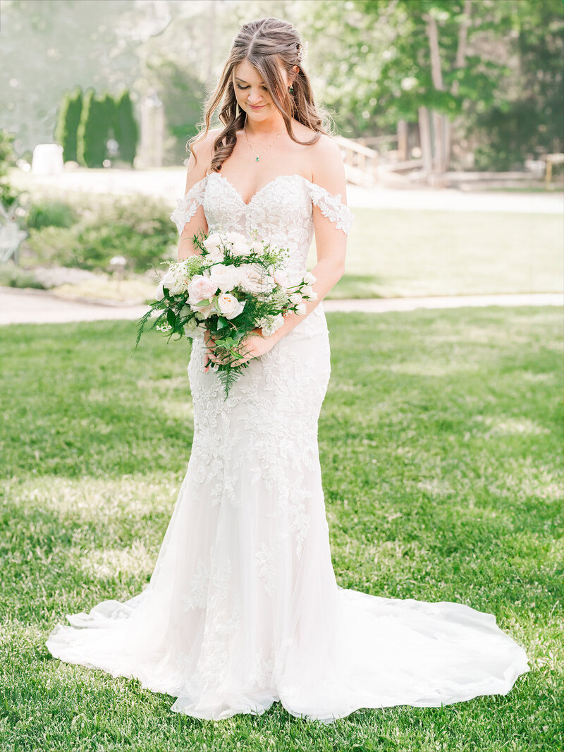 A brunette bride on her wedding day at the Angus Barn by JoLynn Photography