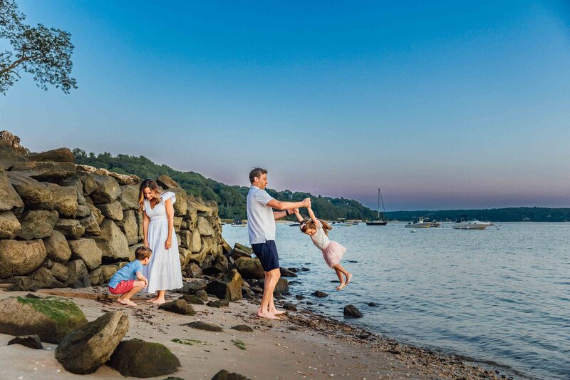 kids playing on beach during long island family photo shoot