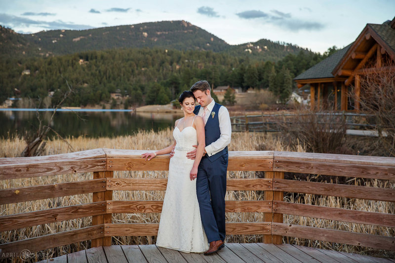 Evergreen Lake House wedding during March with portrait on the wood boardwalk