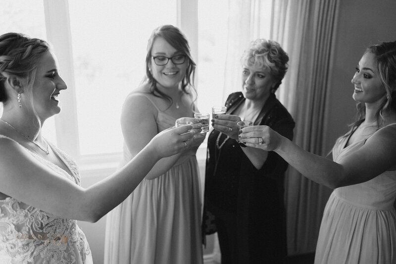 Women raising their glasses for a toast
