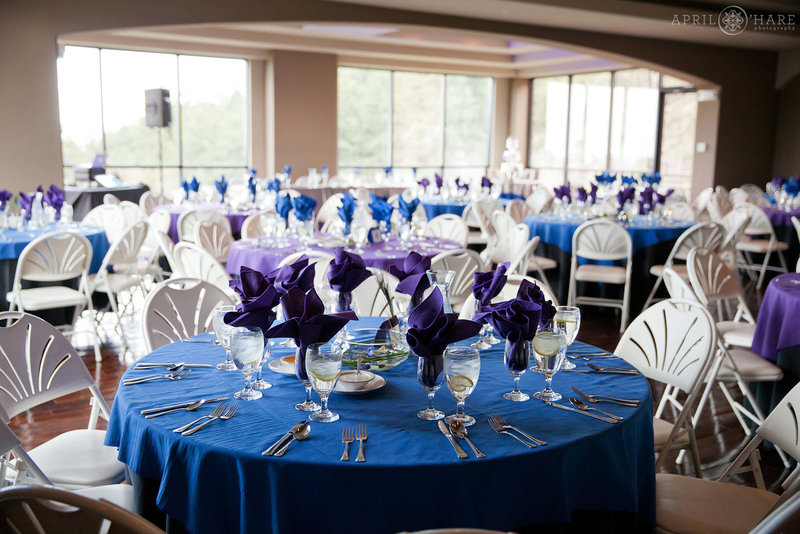 Downstairs reception room set up with blue and purple decor at Pines at Genesee