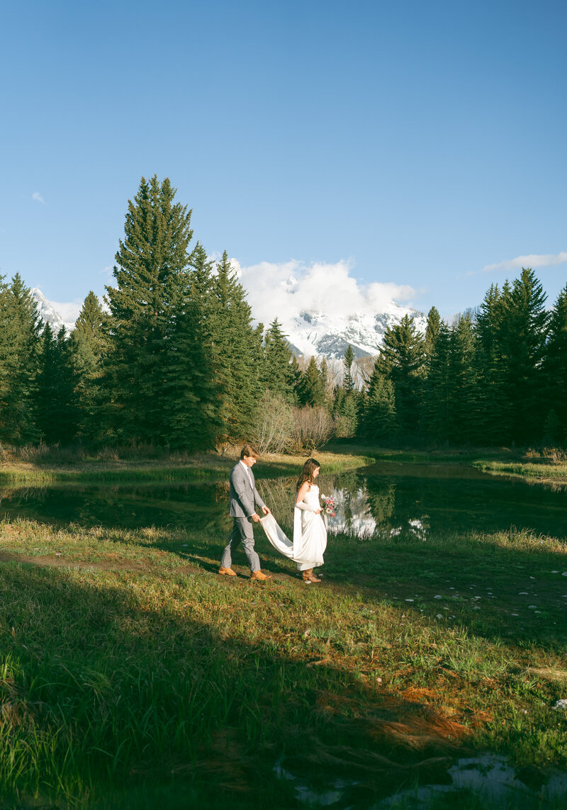 colorado elopement photographer in rocky mountain national park, couple hiking at sunrise