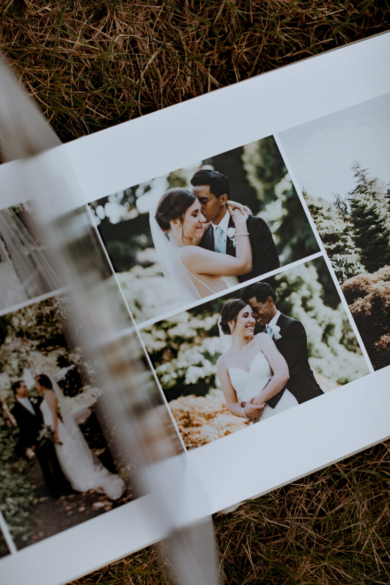 A page of a wedding album of a bride and groom hugging