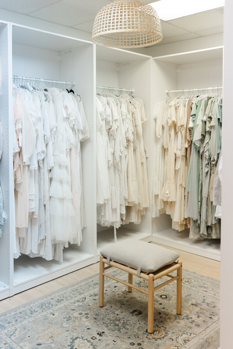 Closet filled with women's dresses for family portraits
